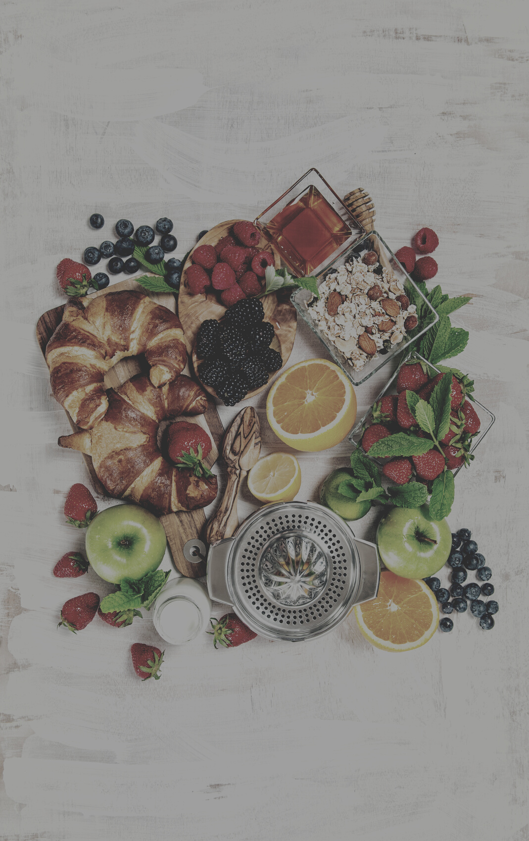 Breakfast table croissants berries fruits Healthy food drink
